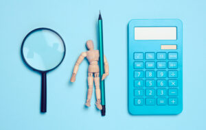 Calculatrice et loupe pour bilan retraite